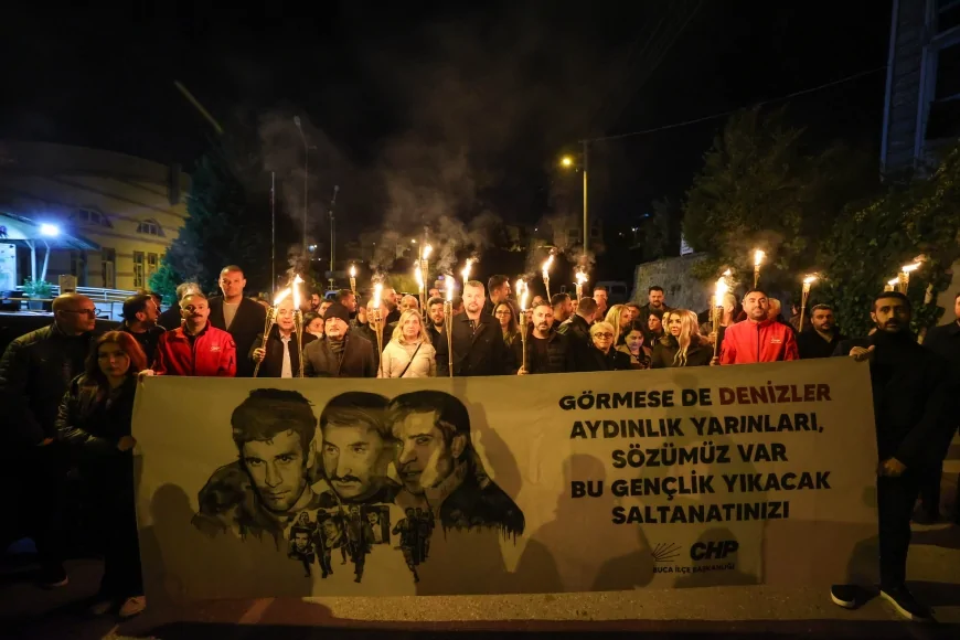BUCA’DA ÜÇ FİDAN İÇİN MEŞALELİ YÜRÜYÜŞ DÜZENLENDİ 54 YIL SONRA AYNI MESAJ VERİLDİ
