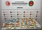 Ticaret Bakanlığı ekipleri Antalya Havalimanı’nda bebek bezlerine gizlenmiş 381 bin 750 Avro ele geçirdi