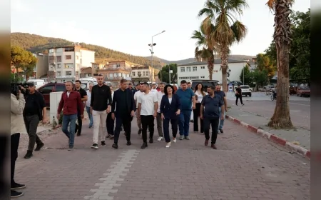 BAŞKAN TUGAY KINIK'TA MUHARREM LOKMASINI PAYLAŞTI