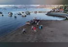 Marmaris Belediyesi ekipleri sahilleri sabahın erken saatlerinden itibaren yeni güne hazırlıyor